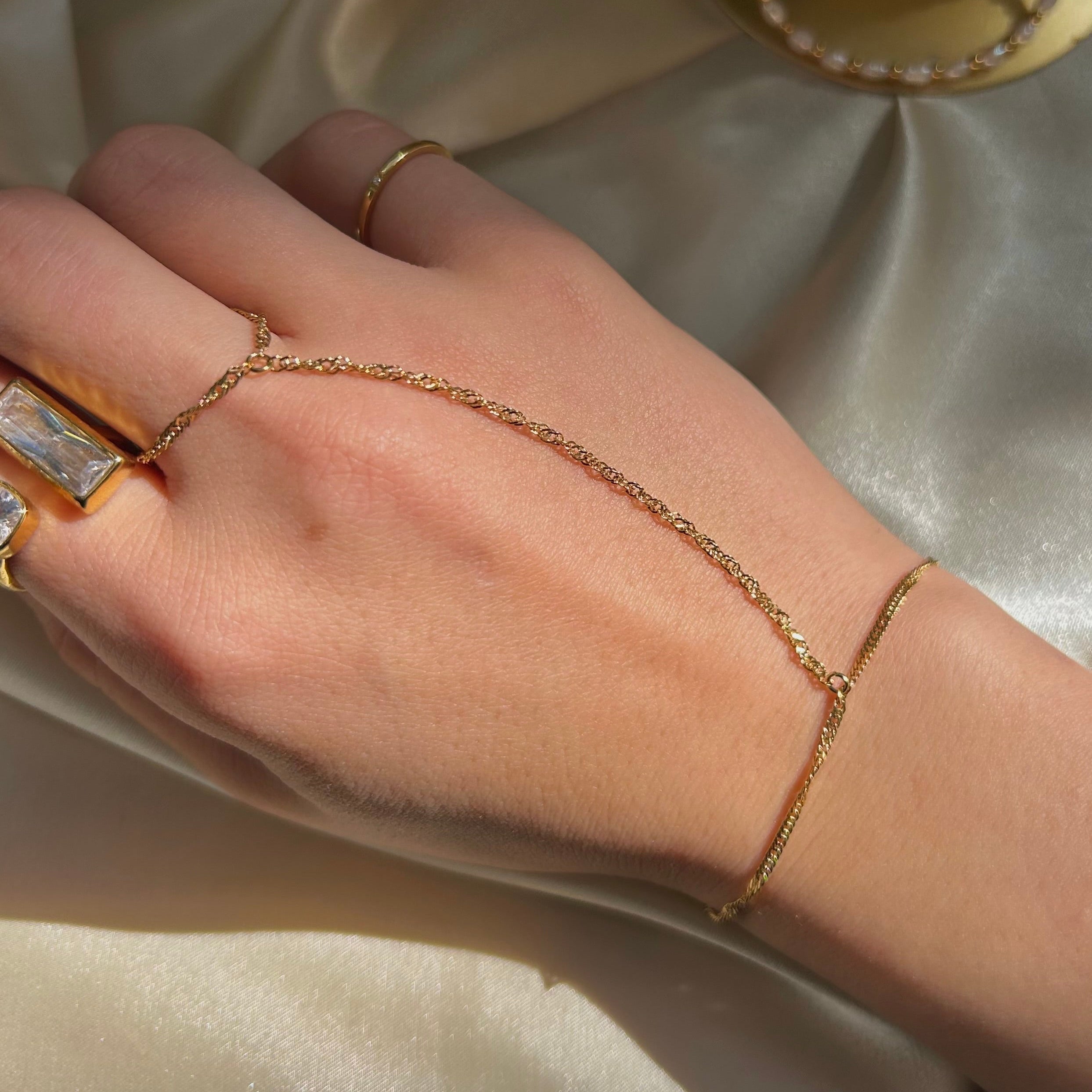 Vela Handchain